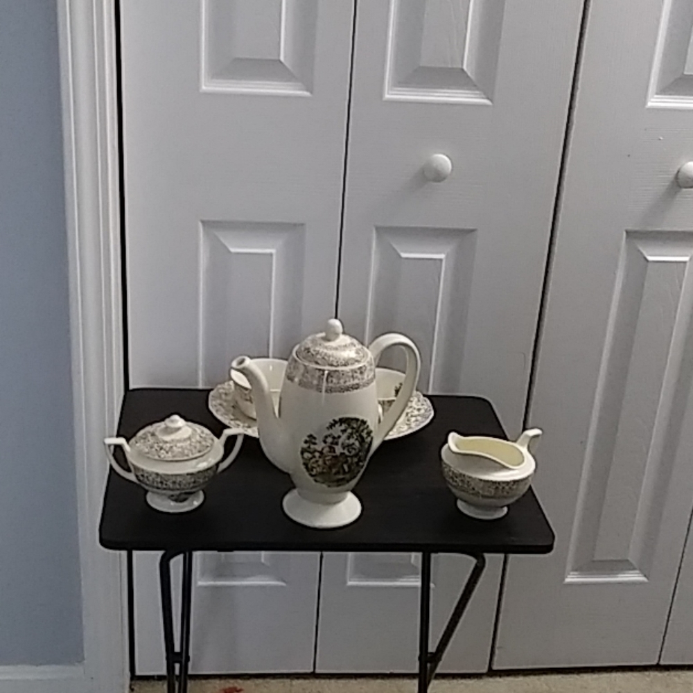 Tea pot with creamer and sugar set